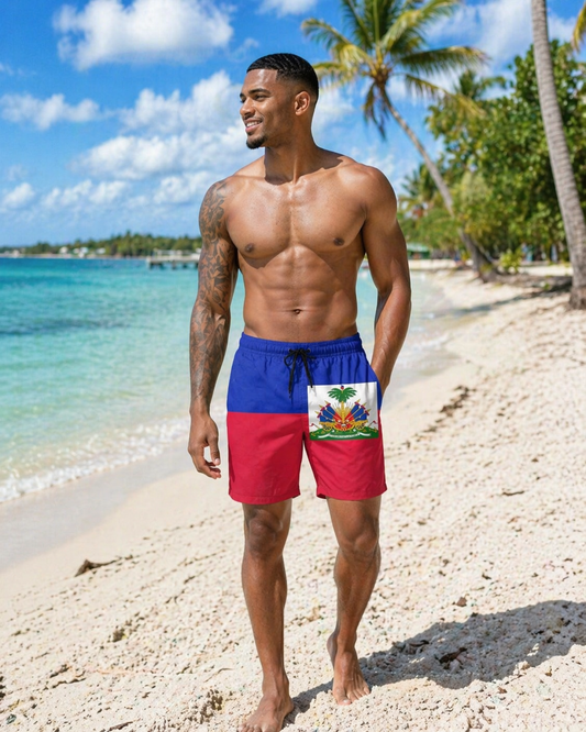Man wearing a swimsuit with Haiti flag design on a beach