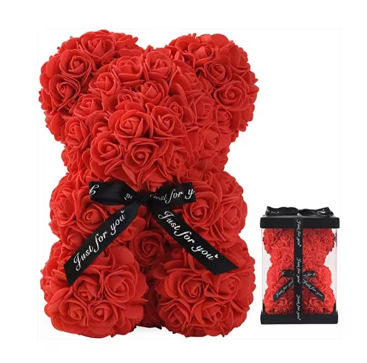 Red rose teddy bear with a smaller rose bear inside on a white background