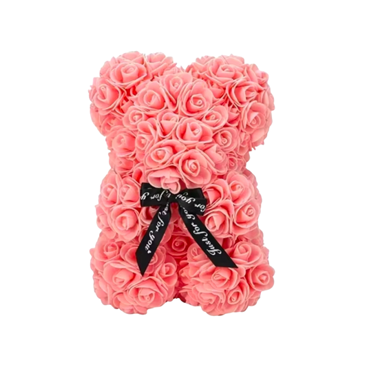 Pink rose bear with a black ribbon on a white background