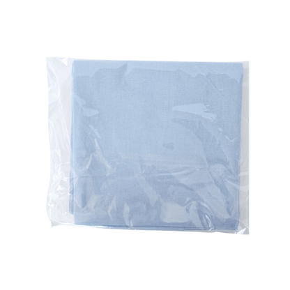 Light blue fabric Spiritual Mouchwa in a clear plastic package on a white background
