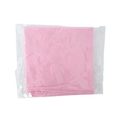 Pink fabric Spiritual Mouchwa in a clear plastic bag on a white background