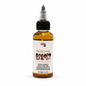 Bottle of Rising Crown Hair Growth Oil on a white background