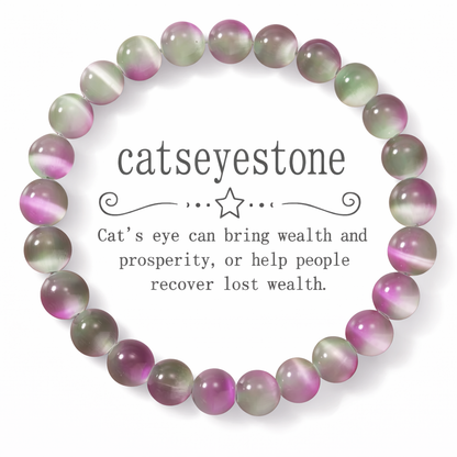 Catseyestone bracelet with purple and green beads on a white background